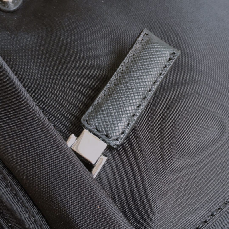Pra*a clutch bags
